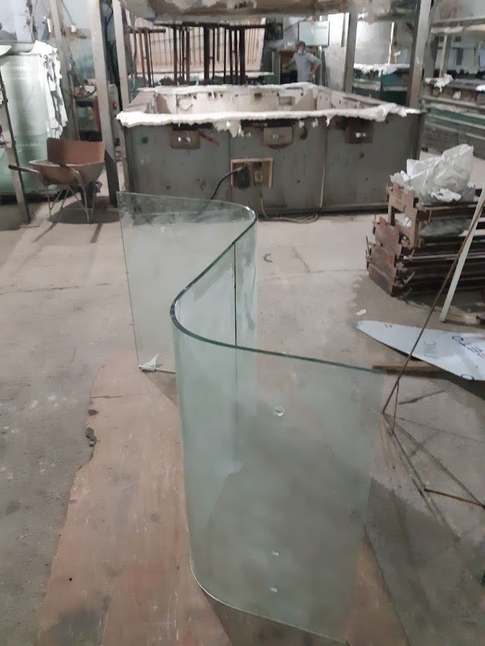 Curved white glass